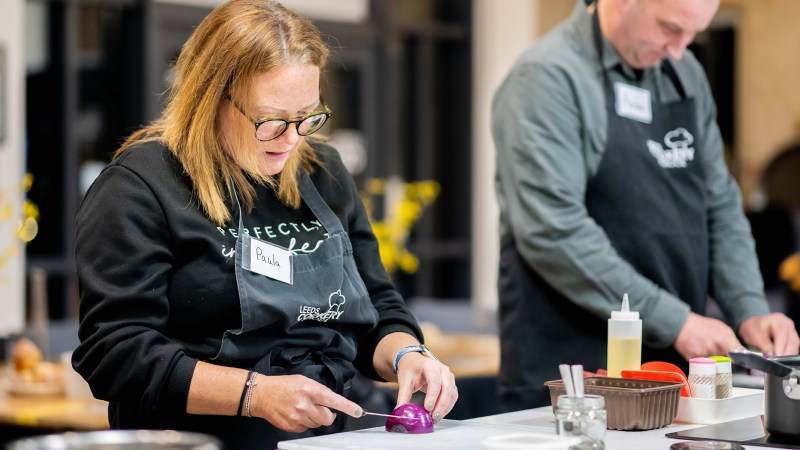 Knife Skills Image 4 a woman sitting at a table